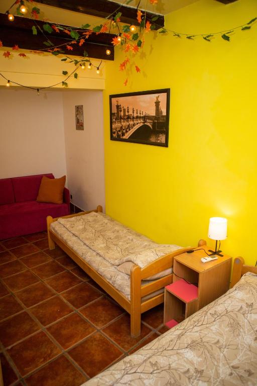 Postel nebo postele na pokoji v ubytování Hostel Iris