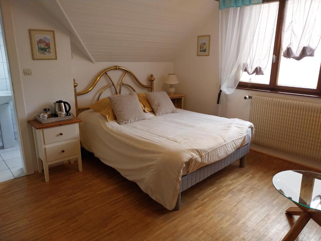 Postel nebo postele na pokoji v ubytování Chambre d'hôtes du Zellberg