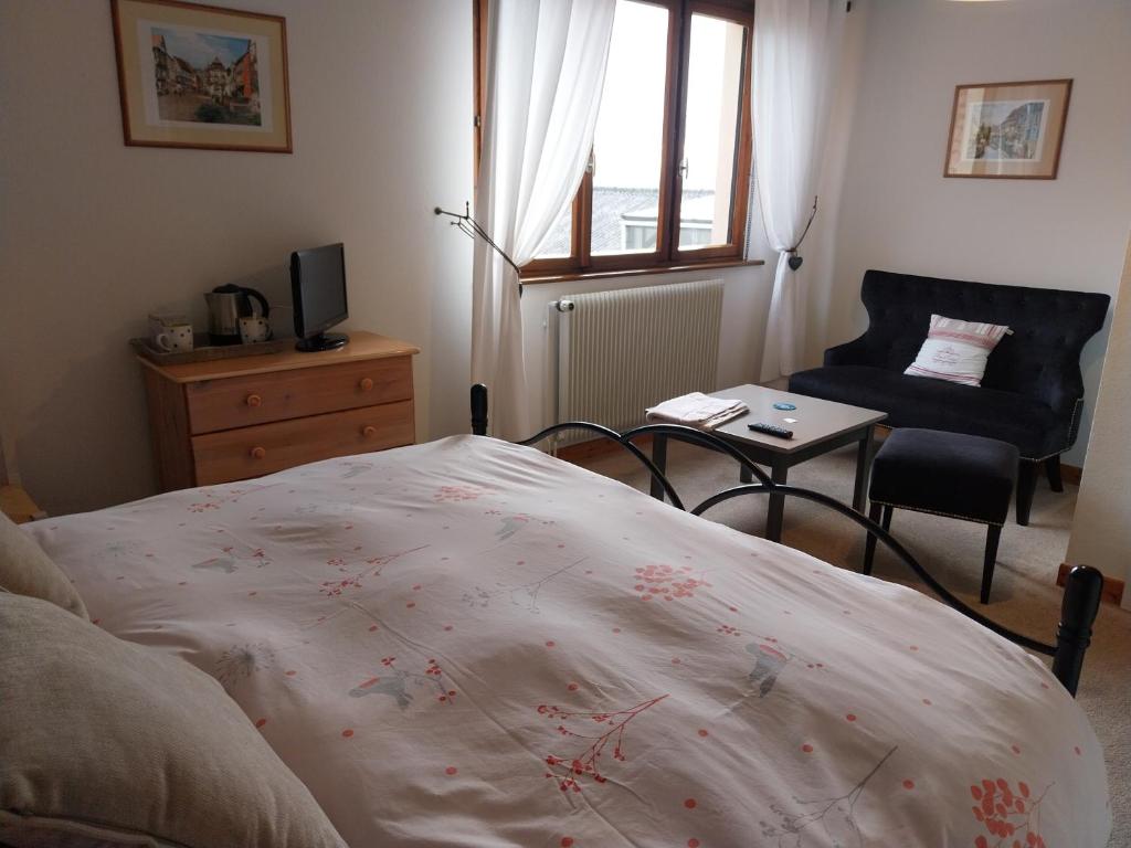 Postel nebo postele na pokoji v ubytování Chambre d'hôtes du Zellberg