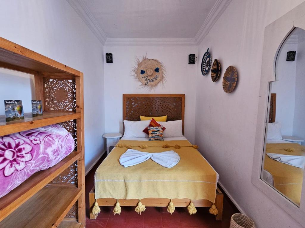 Postel nebo postele na pokoji v ubytování Riad Córdoba