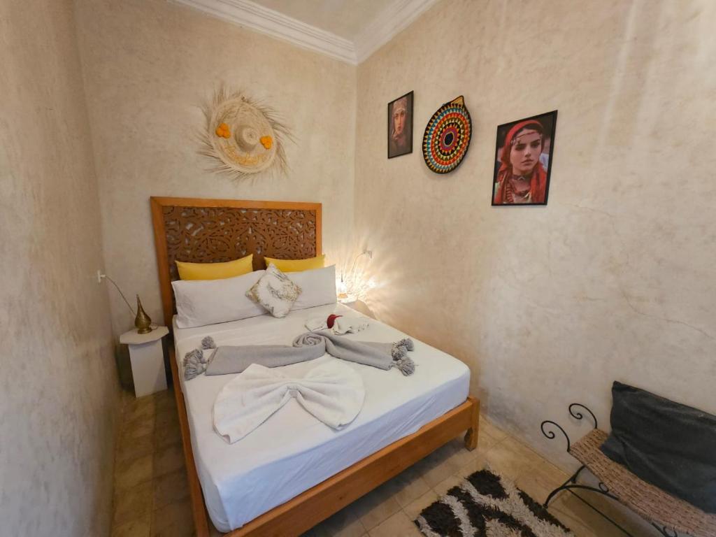 Postel nebo postele na pokoji v ubytování Riad Córdoba