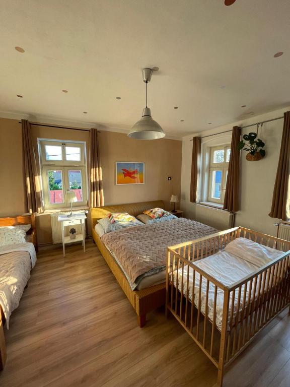 Postel nebo postele na pokoji v ubytování Apartmány Malý Princ