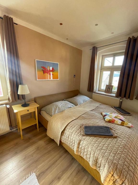 Postel nebo postele na pokoji v ubytování Apartmány Malý Princ