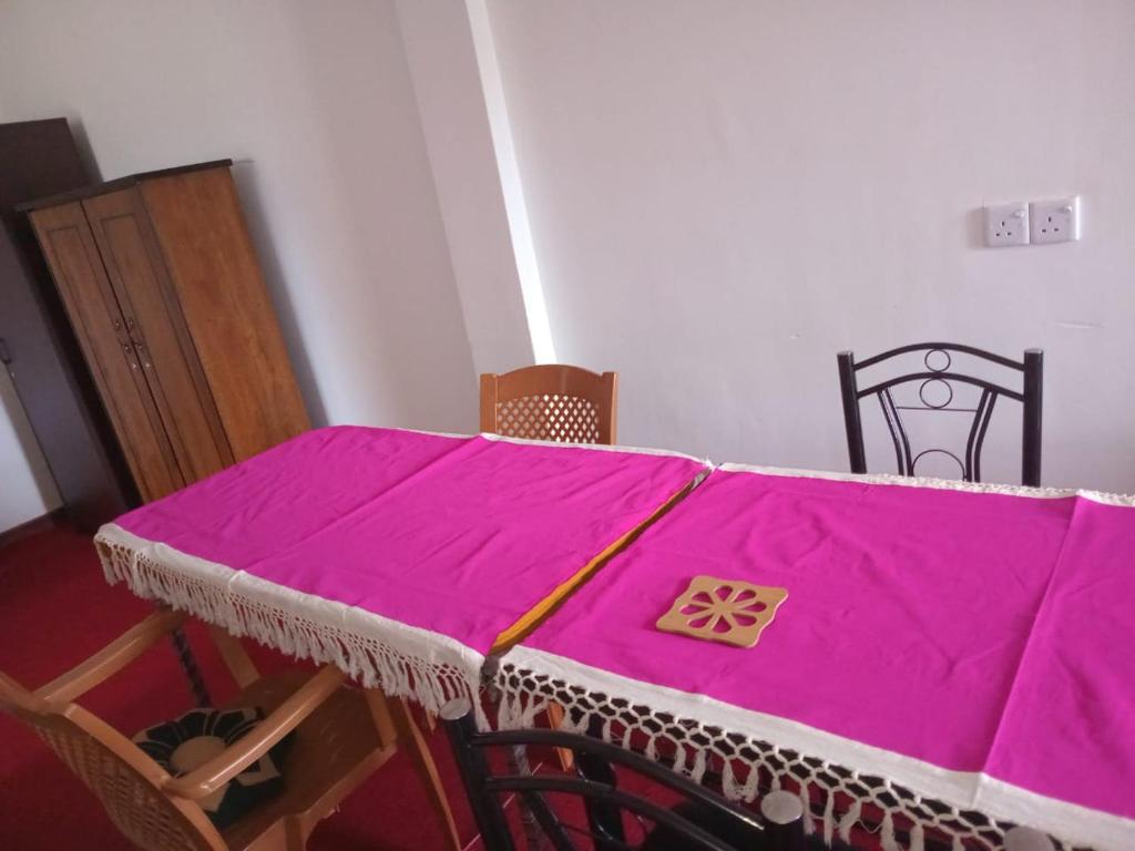 Postel nebo postele na pokoji v ubytování Frosty Heaven Guest House