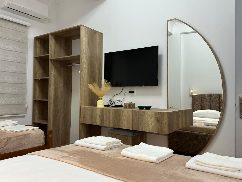 Postel nebo postele na pokoji v ubytování Lola's Rooms