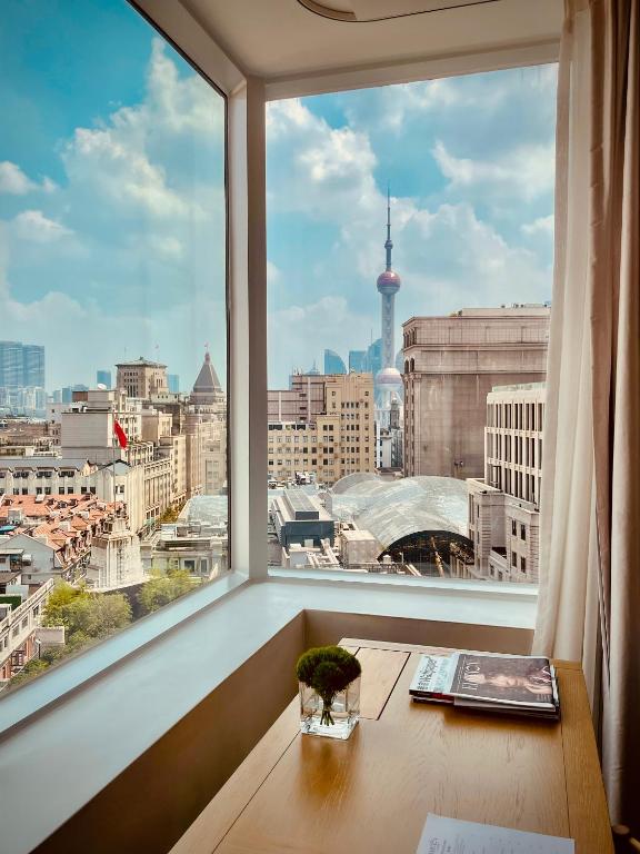 Nespecifikovaný výhled na destinaci Šanghaj nebo výhled na město při pohledu z hotelu