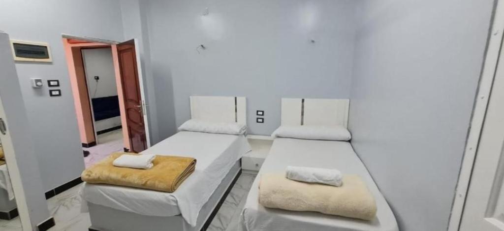 Postel nebo postele na pokoji v ubytování City center NewAswan Aswan 2