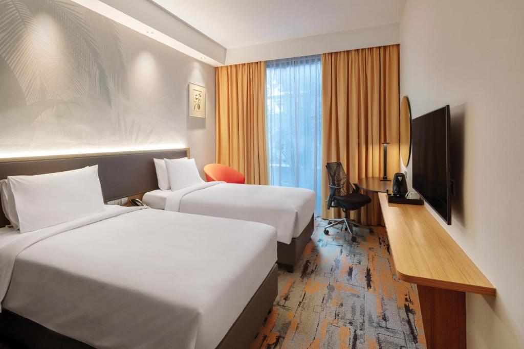 TV/trung tâm giải trí tại Holiday Inn Express Singapore Orchard Road by IHG