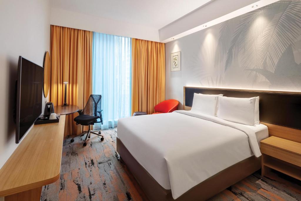 TV/trung tâm giải trí tại Holiday Inn Express Singapore Orchard Road by IHG