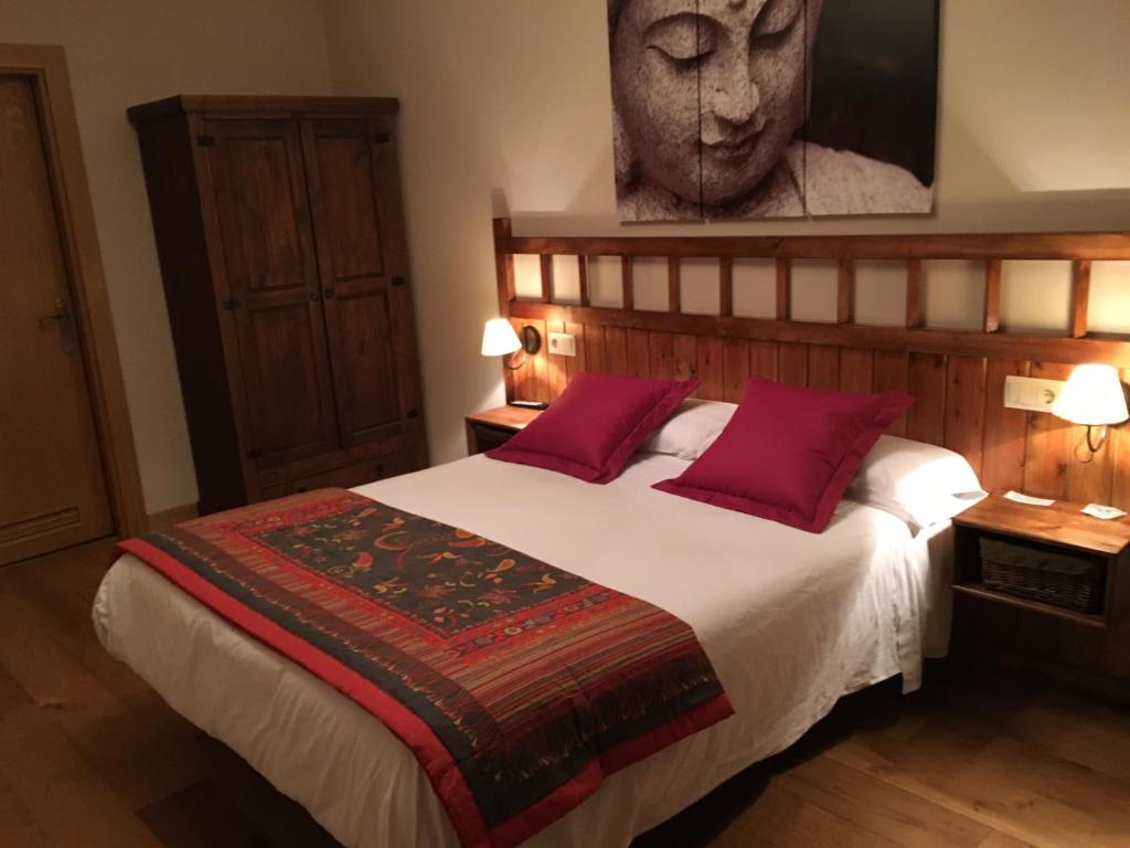 Postel nebo postele na pokoji v ubytování Hostal Otsoa