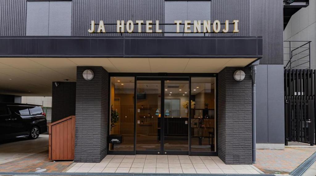 a hotel sign on the front of a building at JA Hotel Tennoji in Osaka