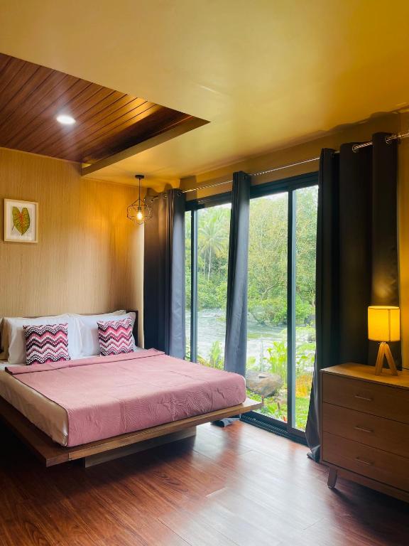 Postel nebo postele na pokoji v ubytování Jinjer Resort