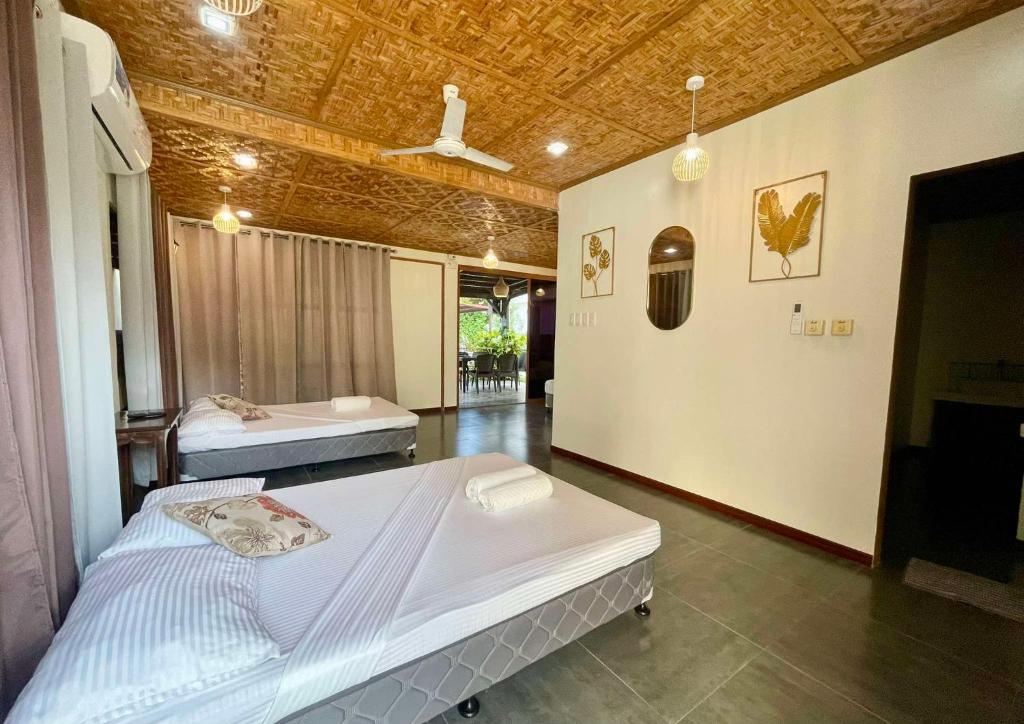 Postel nebo postele na pokoji v ubytování EL SUEÑO RESORT