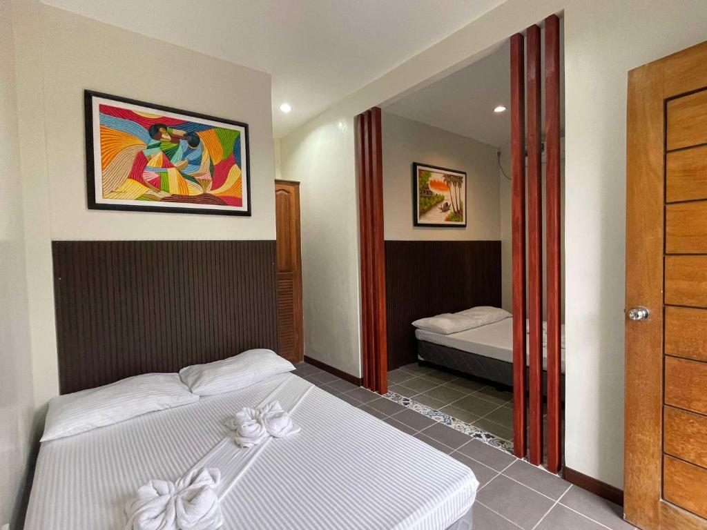 Postel nebo postele na pokoji v ubytování EL SUEÑO RESORT