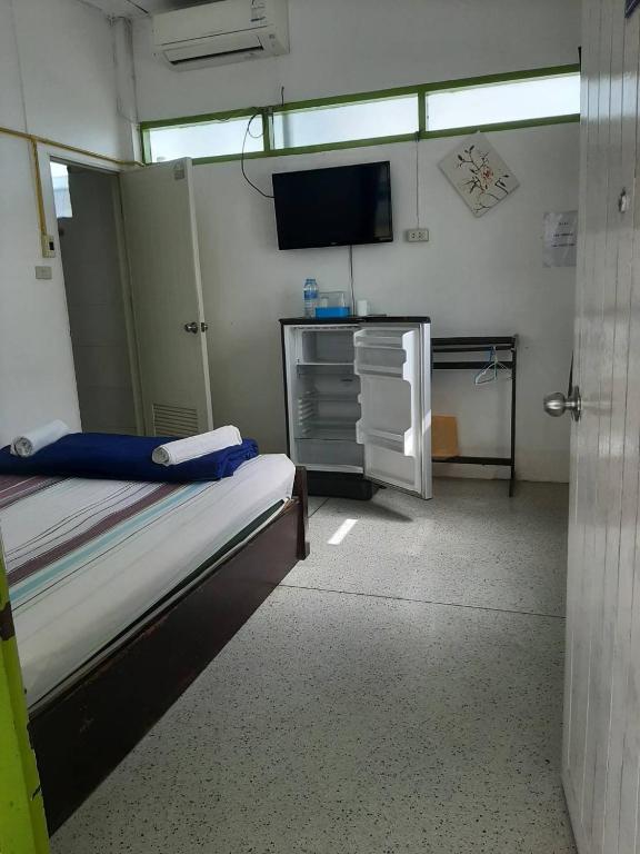 Postel nebo postele na pokoji v ubytování Sukhothai Hotel