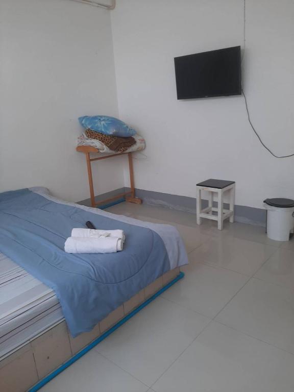 Postel nebo postele na pokoji v ubytování Sukhothai Hotel