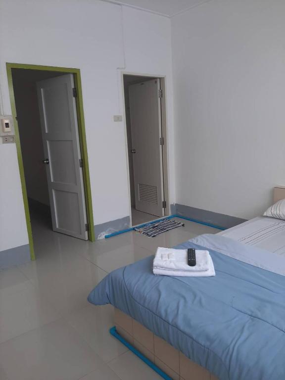 Postel nebo postele na pokoji v ubytování Sukhothai Hotel