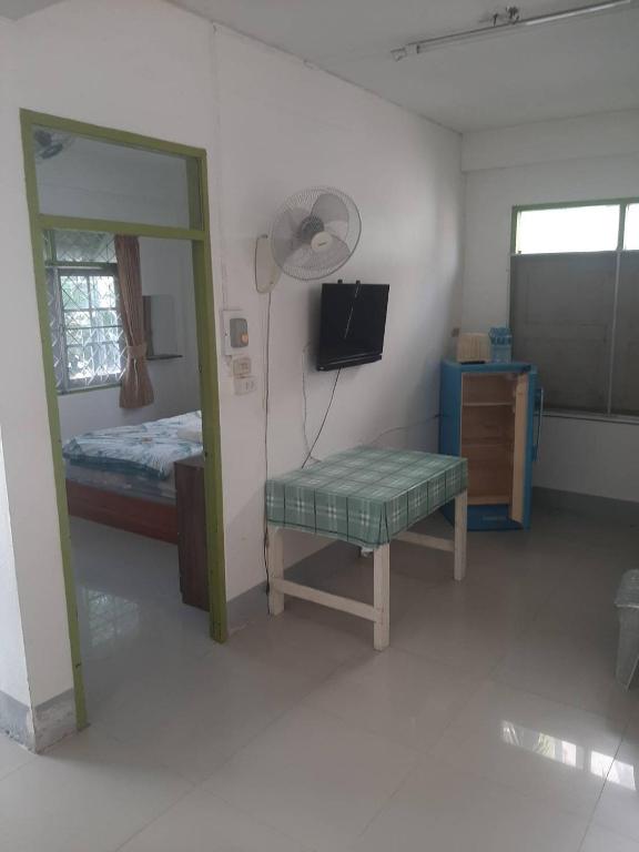 Postel nebo postele na pokoji v ubytování Sukhothai Hotel