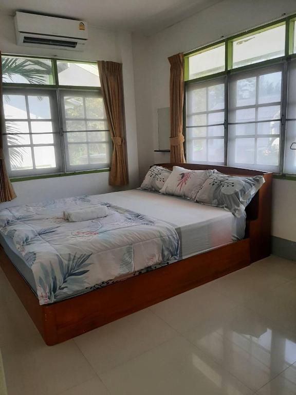Postel nebo postele na pokoji v ubytování Sukhothai Hotel