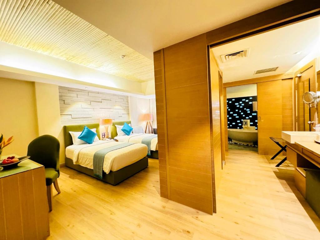 Postel nebo postele na pokoji v ubytování Cyberview Resort & Spa
