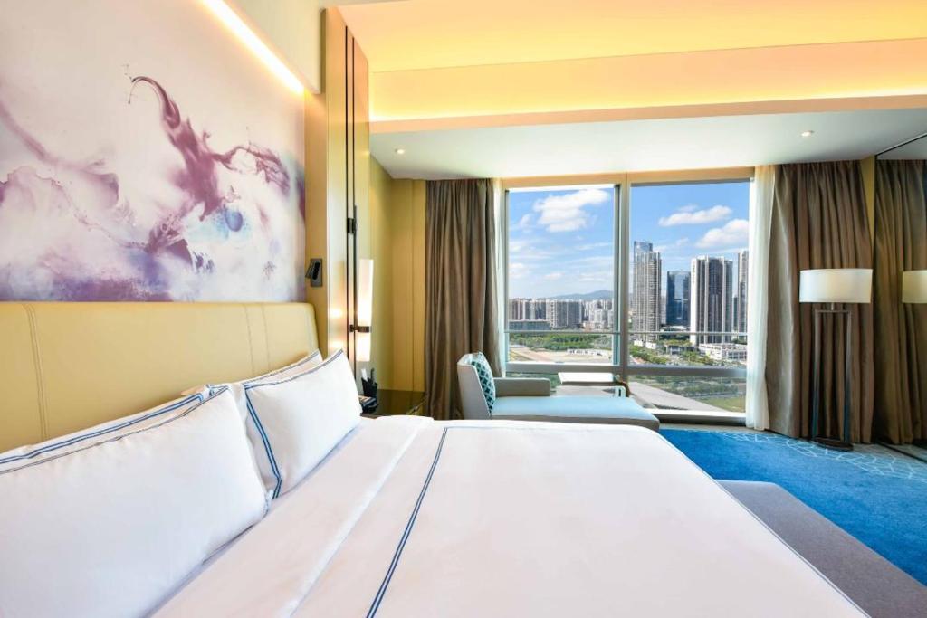 Postel nebo postele na pokoji v ubytování JW Marriott Hotel Shenzhen Bao'an International Airport