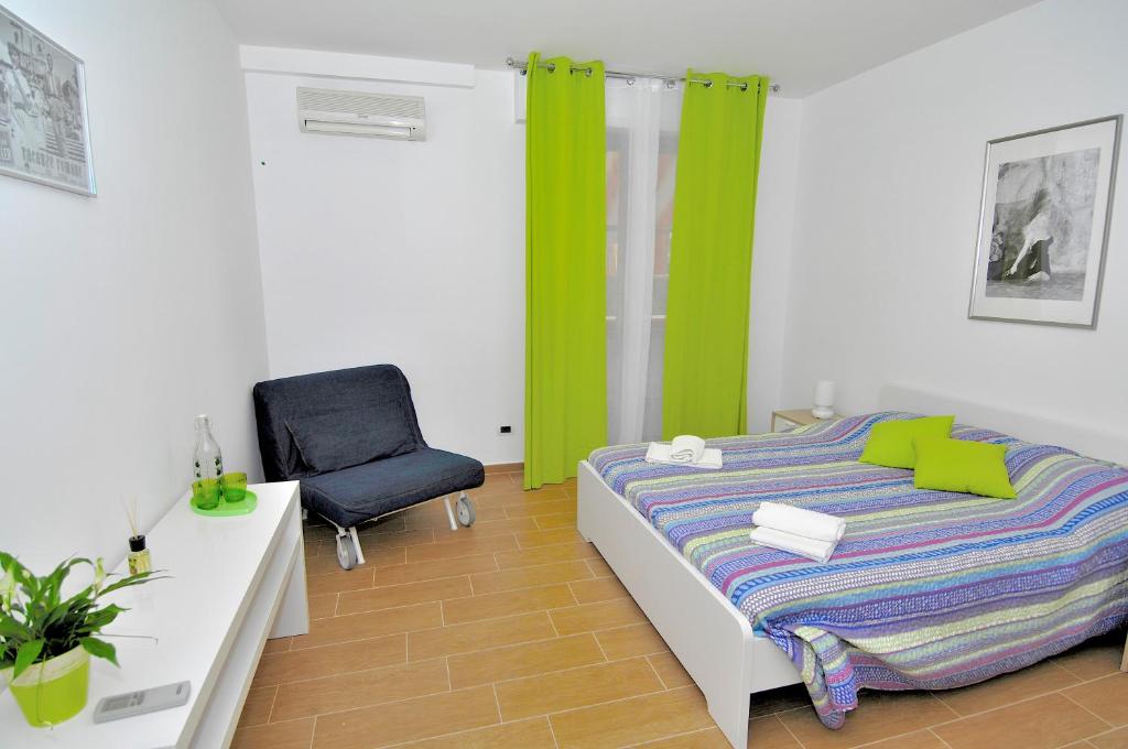 A bed or beds in a room at B&B Nonna Roma