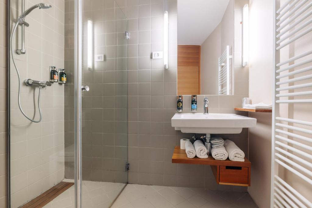 Koupelna v ubytování Hotel Rakar