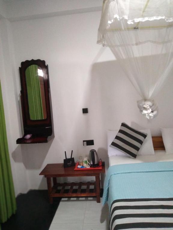 Postel nebo postele na pokoji v ubytování Little Hideaway Guest Home