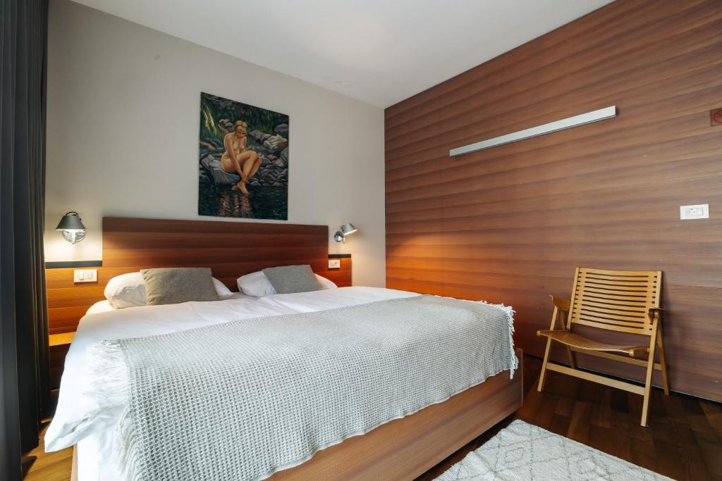 Postel nebo postele na pokoji v ubytování Hotel Rakar