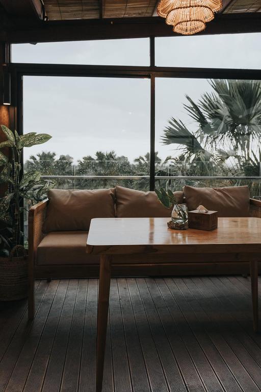 Posezení v ubytování MaxOneHotels at Ubud - CHSE Certified