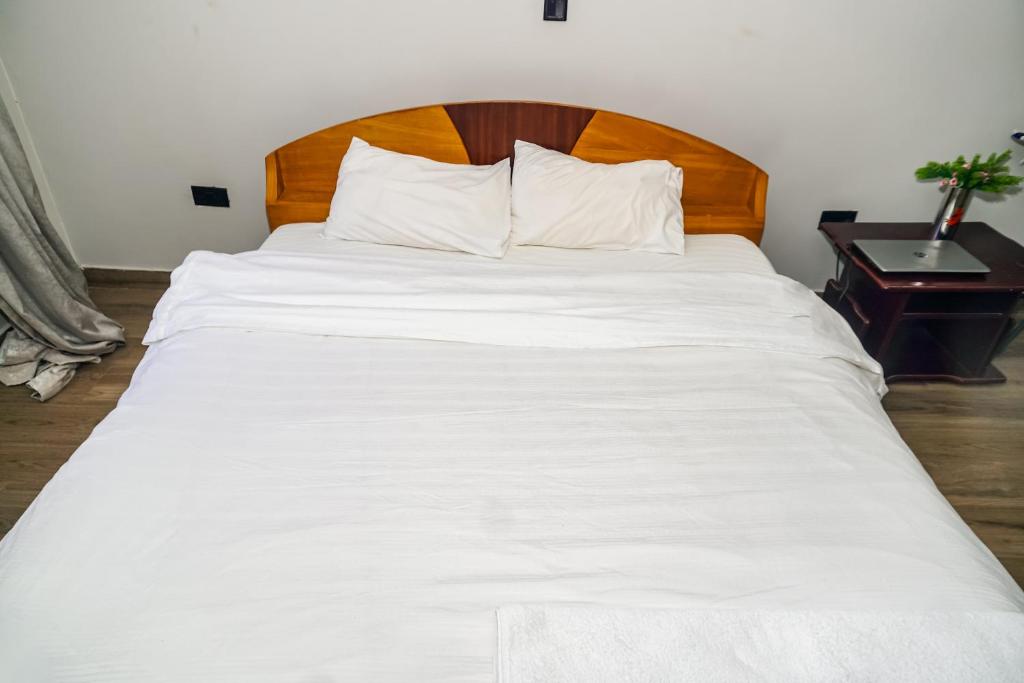 Postel nebo postele na pokoji v ubytování Runda Serene Accomodation