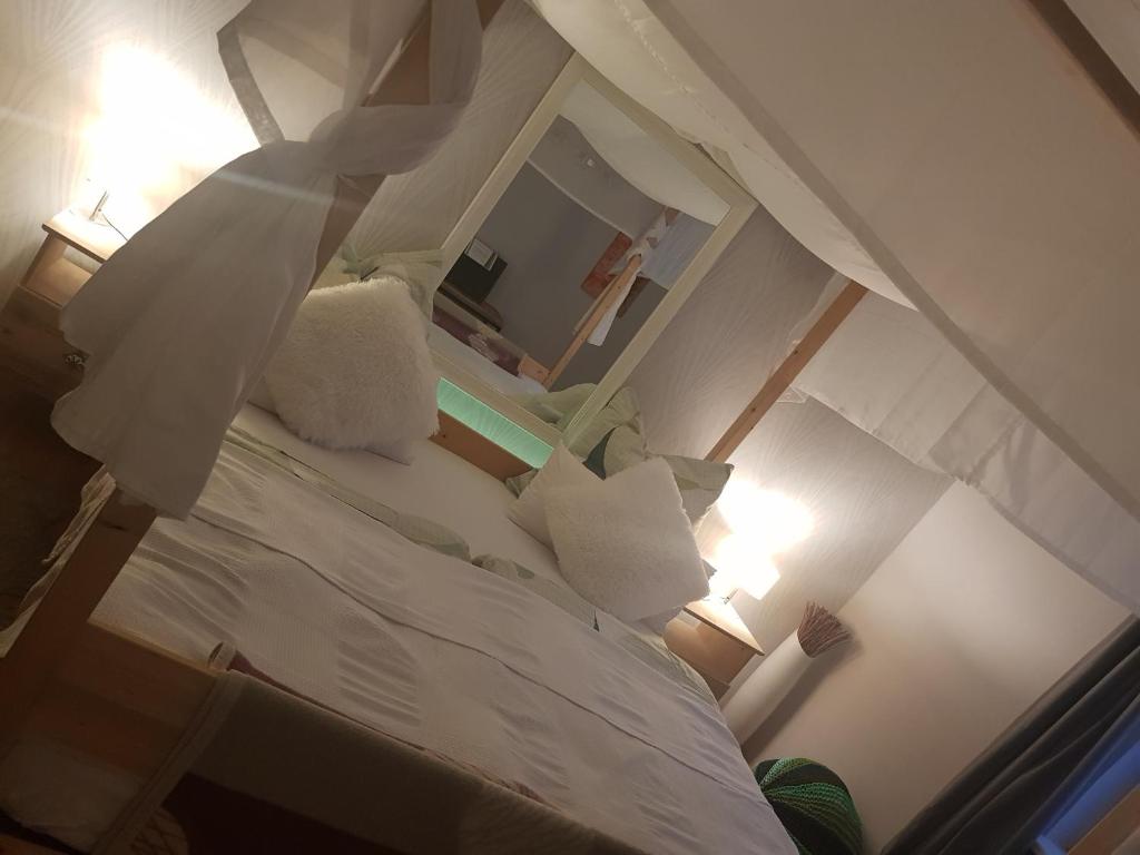 Postel nebo postele na pokoji v ubytování Privatzimmer "Himmlisch Übernachten"