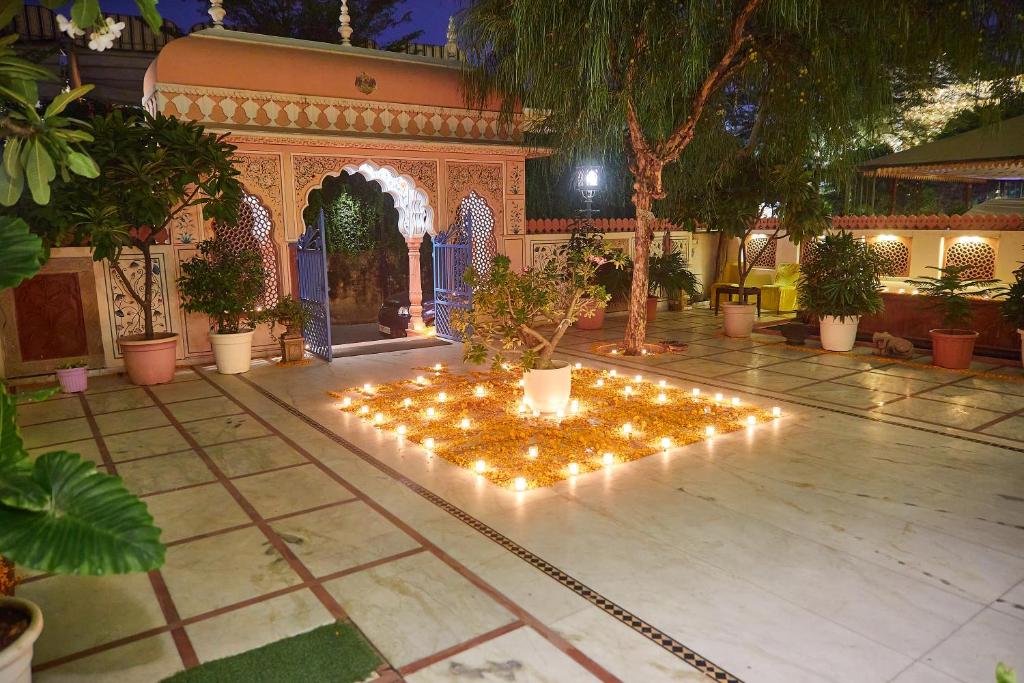 a courtyard with a lot of lit up lights at Suryaa Villa - A Boutique Heritage Hotel in Jaipur