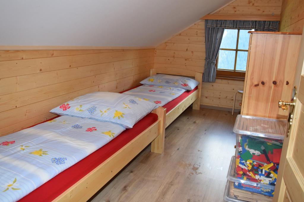 A bed or beds in a room at Ferienwohnung Suntinger