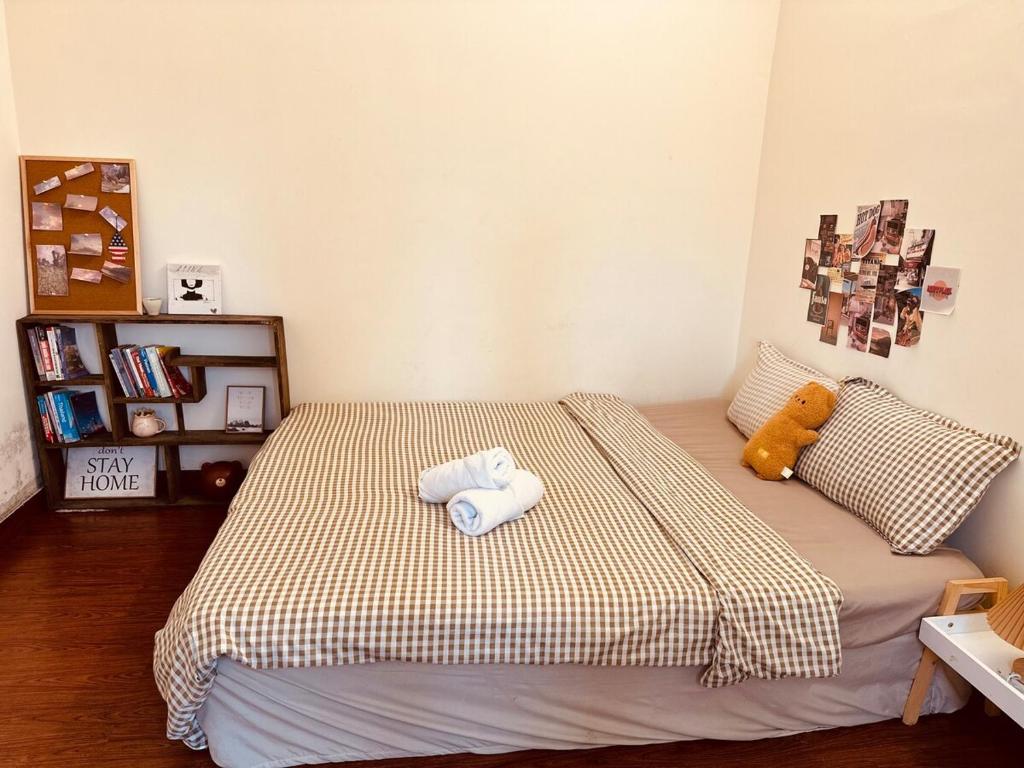 Ένα ή περισσότερα κρεβάτια σε δωμάτιο στο Xanh House XVNT