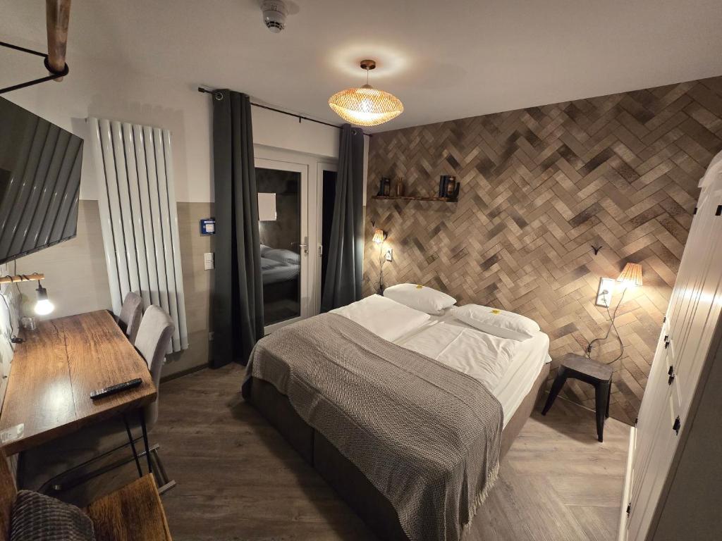 Postel nebo postele na pokoji v ubytování Aparthotel Fairschlafen Minden