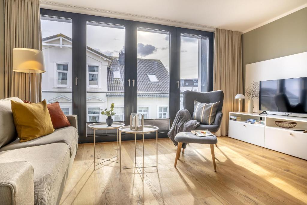 Televiisor ja/või meelelahutuskeskus majutusasutuses InselLoft Wohnung 5