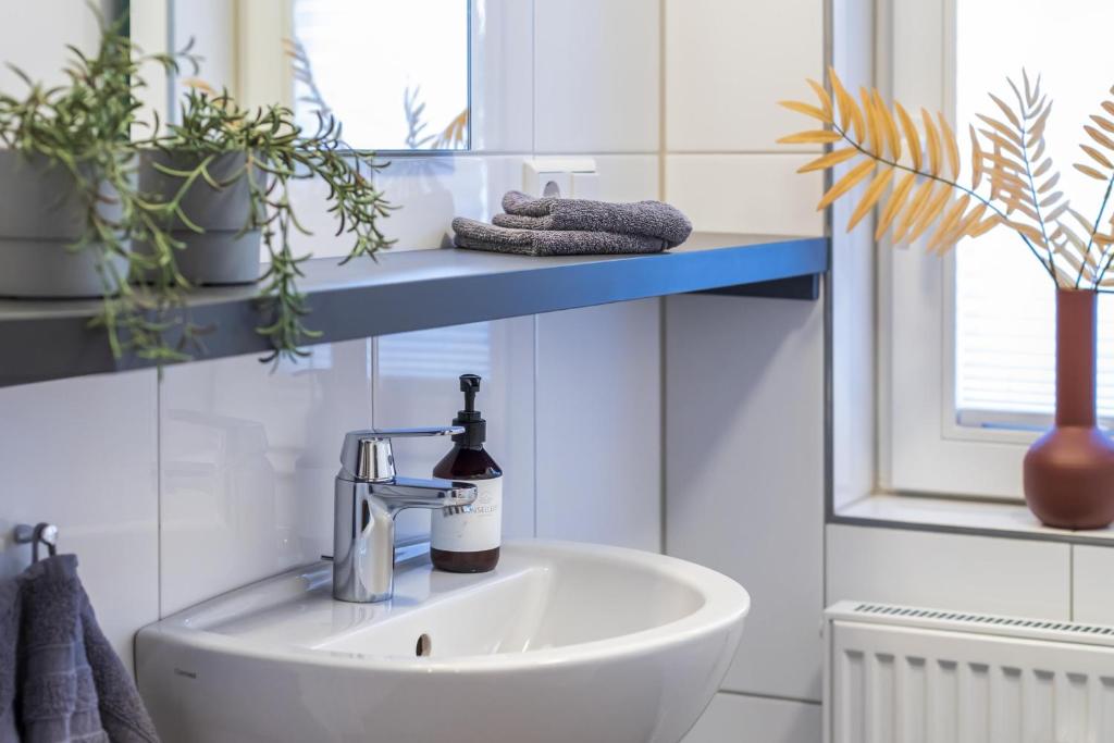 Ένα μπάνιο στο Ferienwohnung Eilert