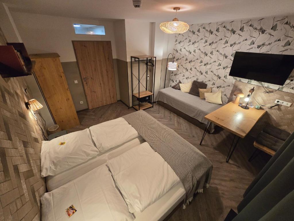Postel nebo postele na pokoji v ubytování Aparthotel Fairschlafen Minden