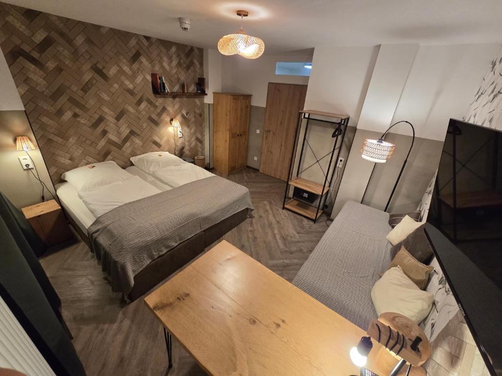 TV a/nebo společenská místnost v ubytování Aparthotel Fairschlafen Minden