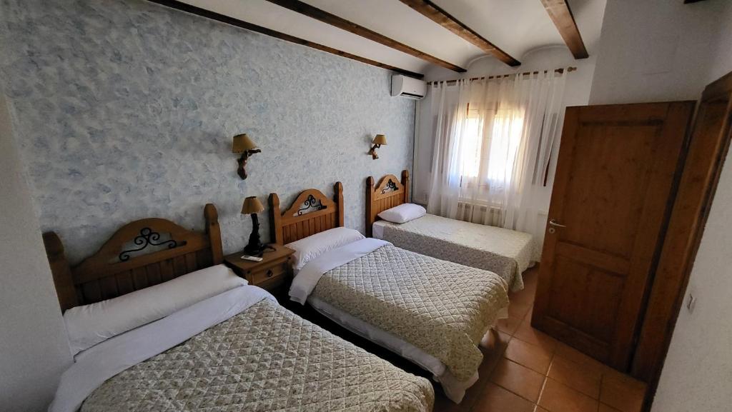 Posteľ alebo postele v izbe v ubytovaní El Mirador de Riópar Viejo