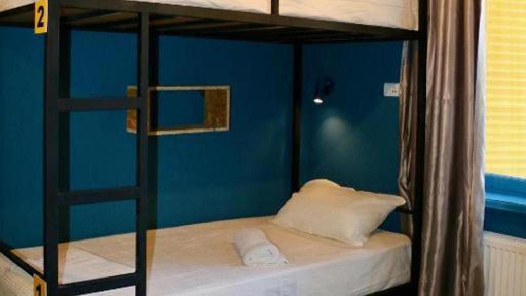 Postel nebo postele na pokoji v ubytování Scary Hostel