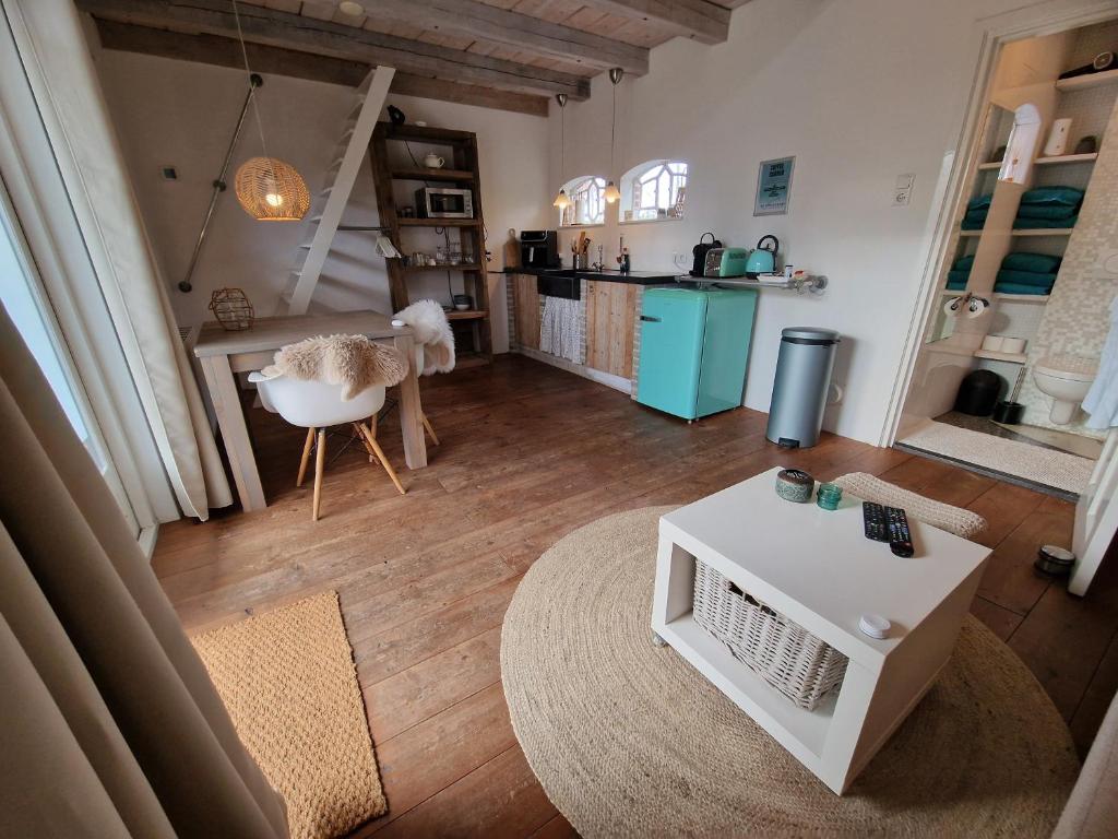 Kuchyň nebo kuchyňský kout v ubytování De Strandkorf