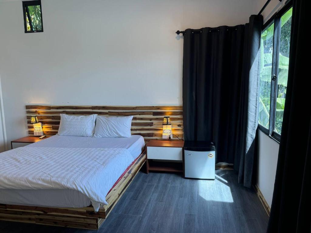 Postel nebo postele na pokoji v ubytování Real Hostel