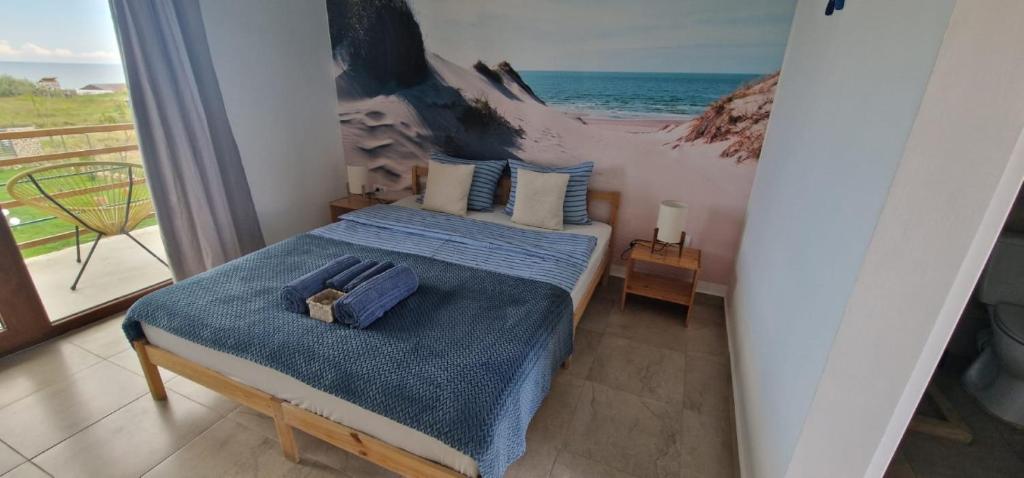 Кровать или кровати в номере SunScape Corbu