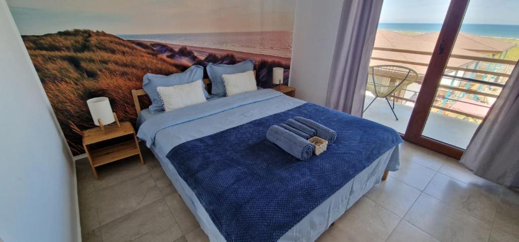 Кровать или кровати в номере SunScape Corbu