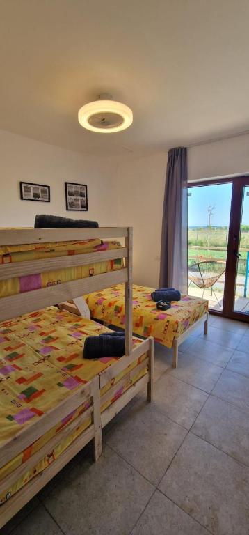 Кровать или кровати в номере SunScape Corbu