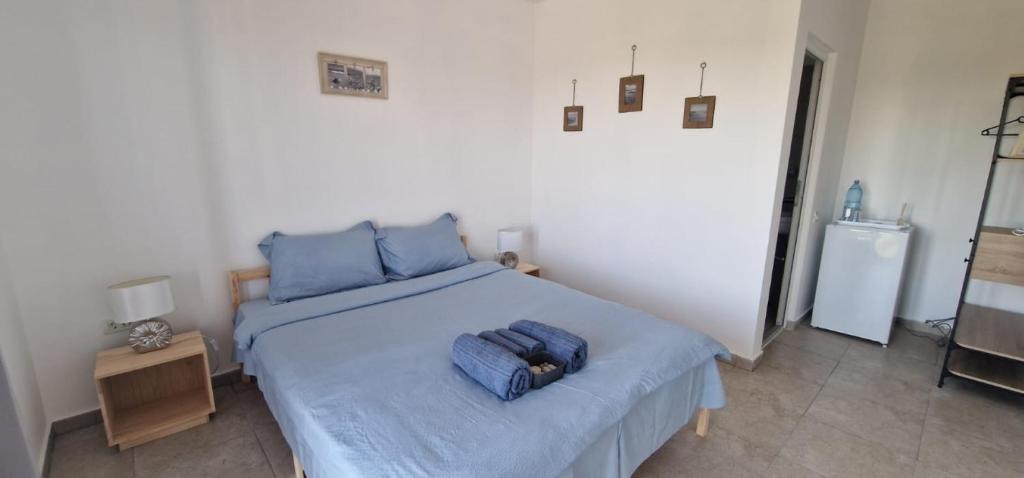 Кровать или кровати в номере SunScape Corbu