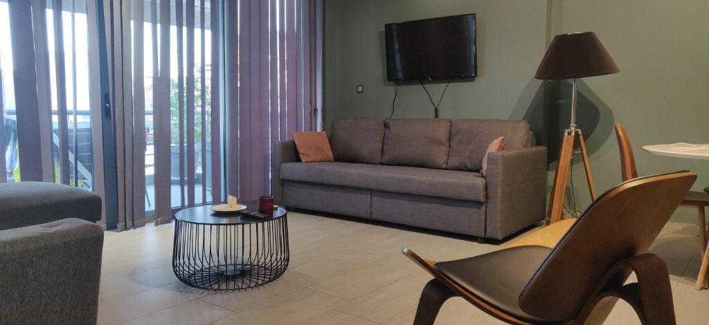 Posedenie v ubytovaní Elegant Bright Apartment with Acropolis view terrace