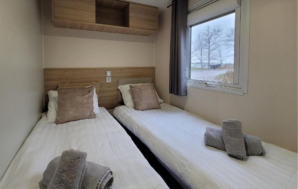 Postel nebo postele na pokoji v ubytování Chalet Lauwersoog